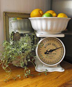 Vintage scales add a unique touch to your farmhouse kitchen countertop