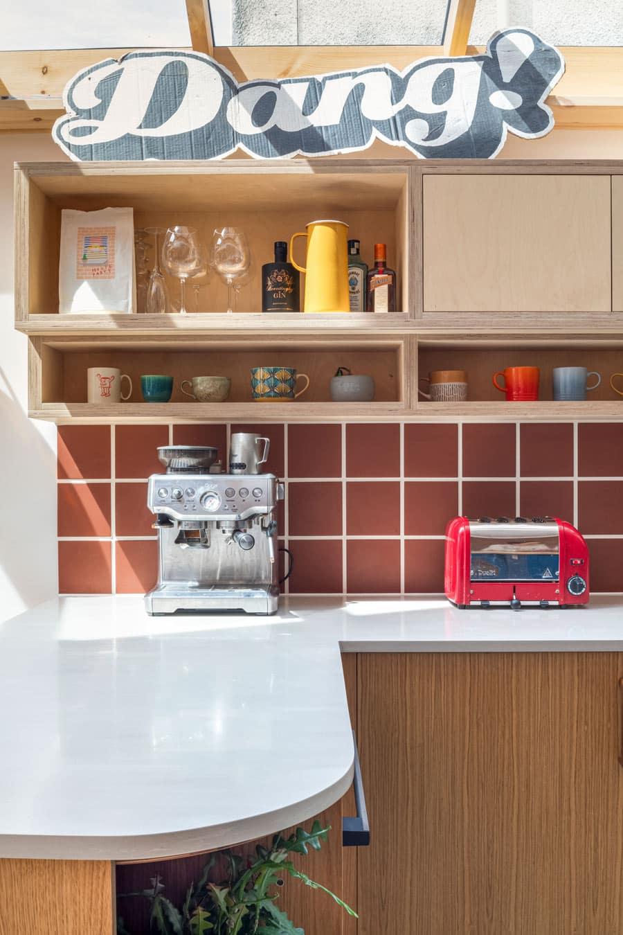 Mix materials for a modern eclectic vibe in‌ your eat-in kitchen