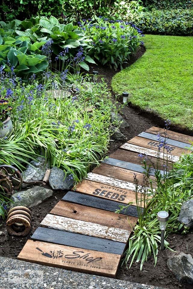 Create a rustic feel with reclaimed wood elements in front yard landscaping