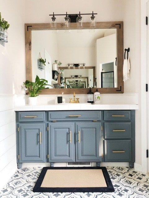 Colorful cabinetry transforms your bathroom into a ​vibrant⁣ oasis