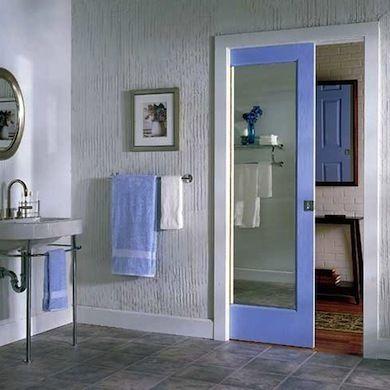 Opt for sliding doors to save space in your narrow bathroom