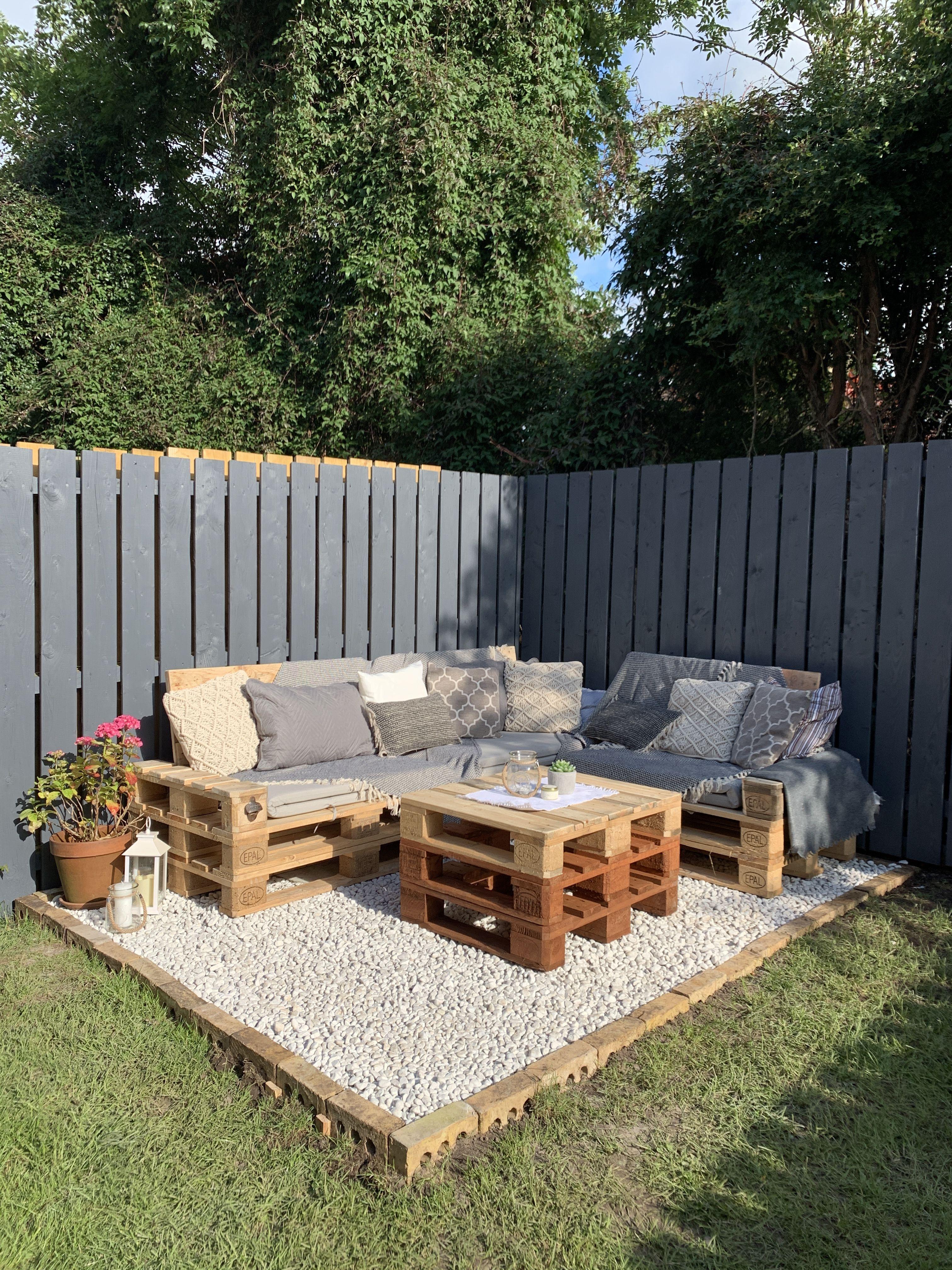 Construct a pallet garden seating area for relaxation​ amidst​ your green oasis