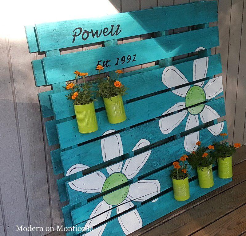 Create whimsical garden art using colorful painted⁣ pallets as a unique backdrop