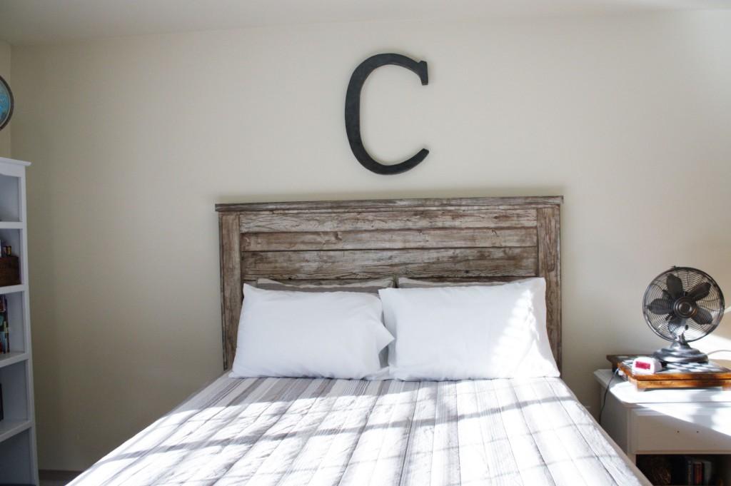 Craft a unique headboard using reclaimed wood in your teen bedroom style