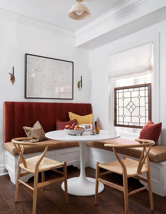 Create a cozy breakfast nook with ​built-in seating in your Burgundy Kitchen