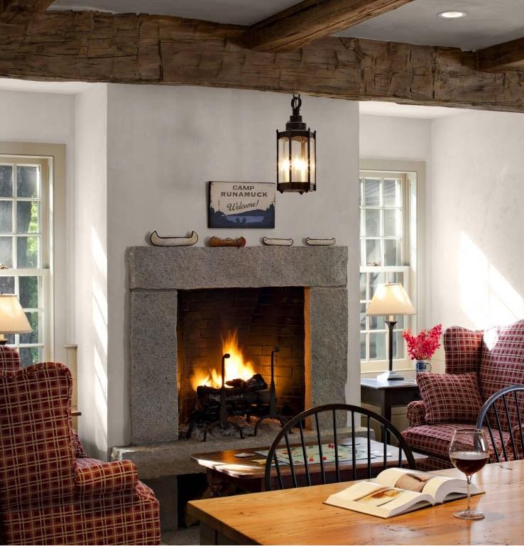 A cozy fireplace or wood stove for warmth in your farmhouse kitchen