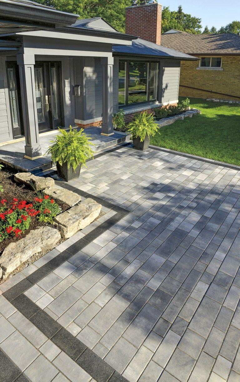 Use pavers to create a unique design in your front yard landscaping