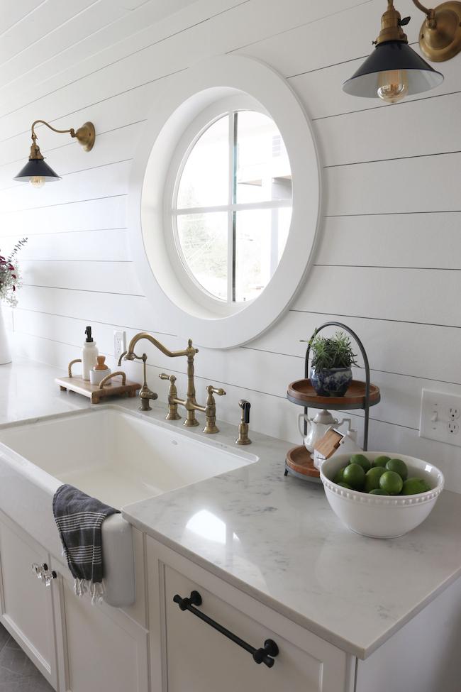 Shiplap walls offer a classic touch in any farmhouse kitchen setting