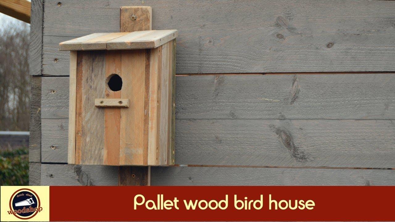 Convert an old pallet into an adorable birdhouse for your Pallet Garden