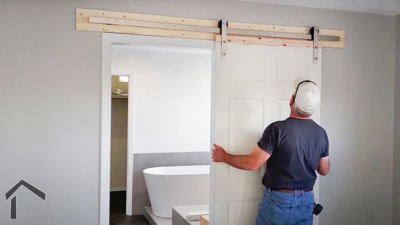 Install‌ a sliding door to save ⁤space in small bathrooms