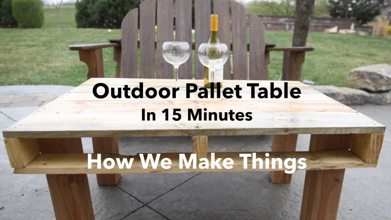 Set up a DIY pallet garden table for an easily accessible plant display