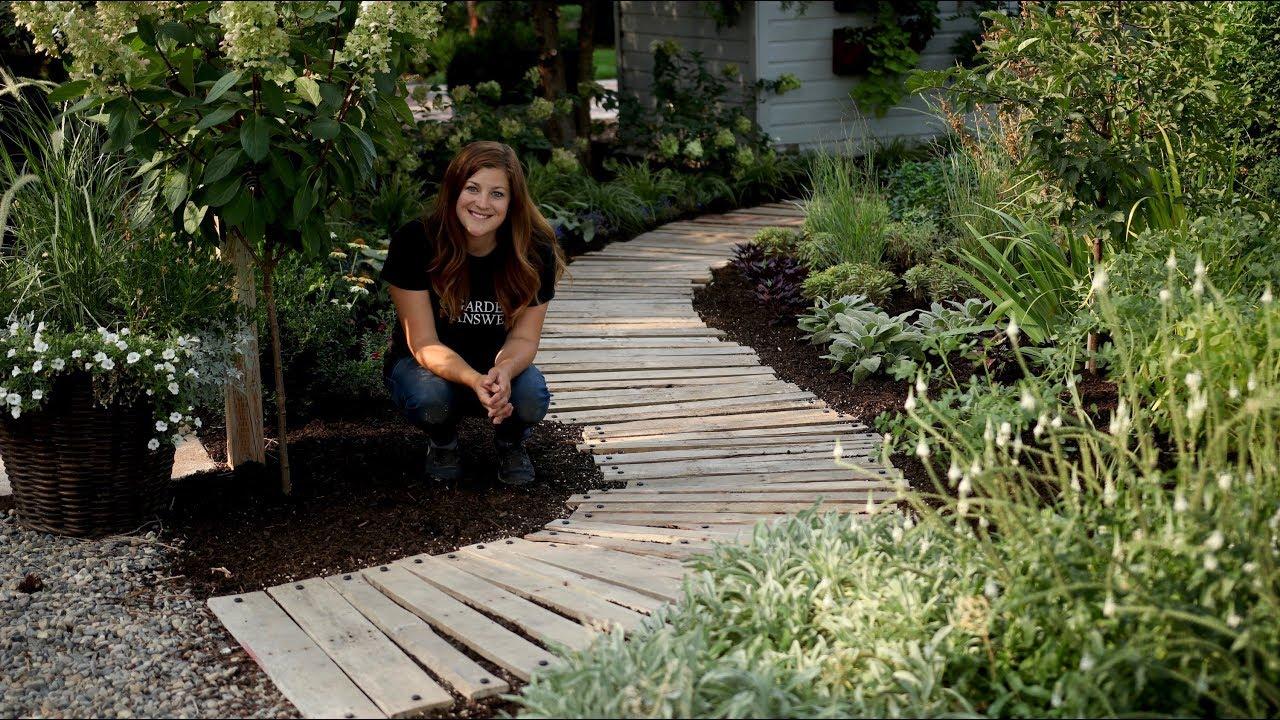 Pallet ‍Garden Pathway: ⁣Create an inviting pathway using flat pallets‍ as stepping stones