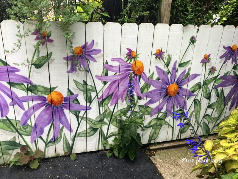 Add whimsical garden decor for a playful touch in your front yard landscaping design