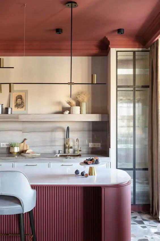 Incorporating greenery can refresh and brighten a burgundy kitchen’s rich ⁣tones