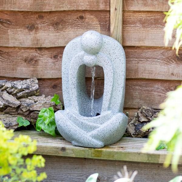 A gentle water feature adds soothing⁤ sounds to your Zen Garden experience