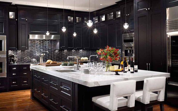 Dark cabinetry provides a dramatic backdrop, making your kitchen feel luxe and inviting