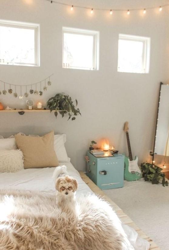 A sleek mirror that opens up the ​teen bedroom space