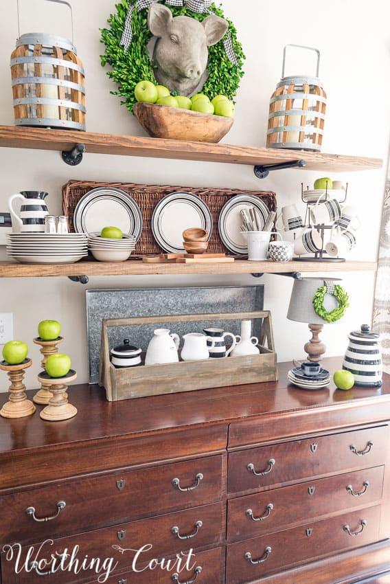 Open shelving showcases your favorite dishes in a charming farmhouse kitchen