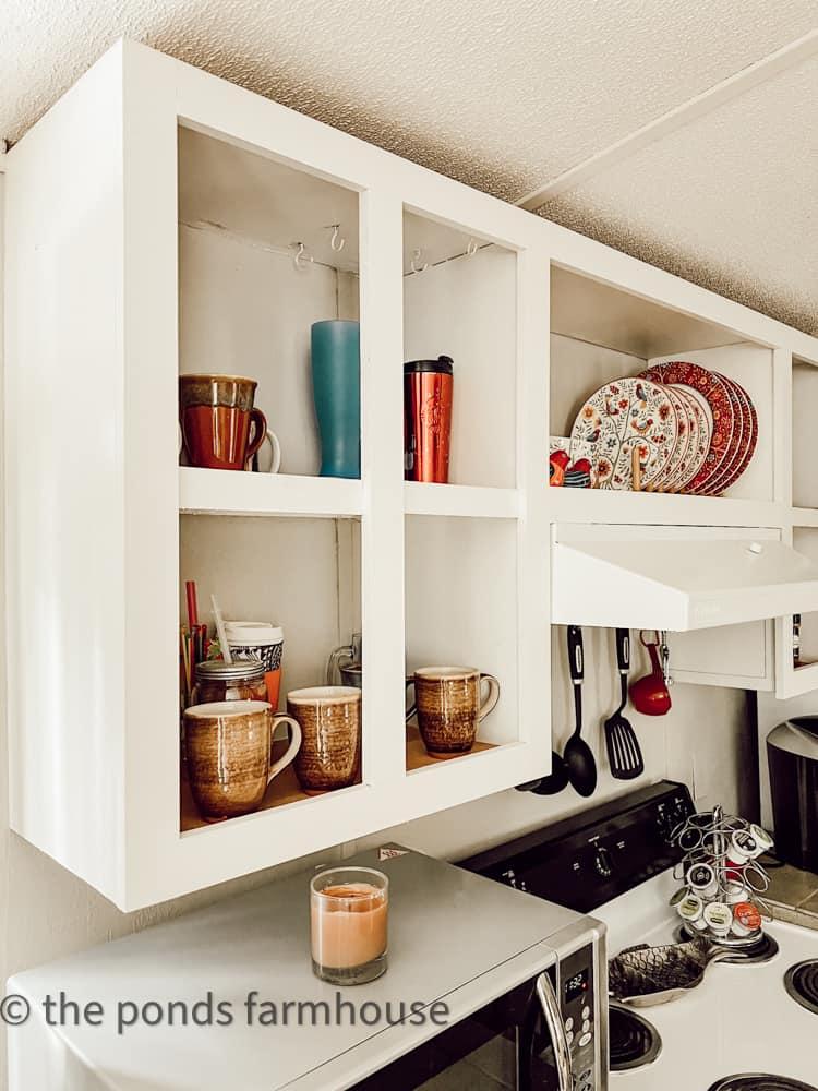 Open shelving to display charming dishware in your farmhouse kitchen adds warmth and character