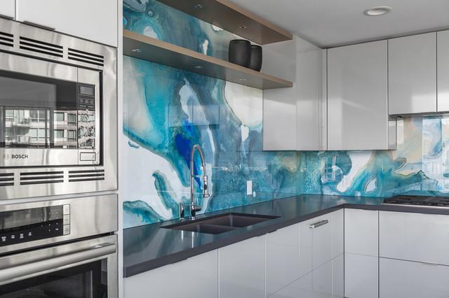 Statement ​backsplashes serve as eye-catching art pieces in contemporary kitchens