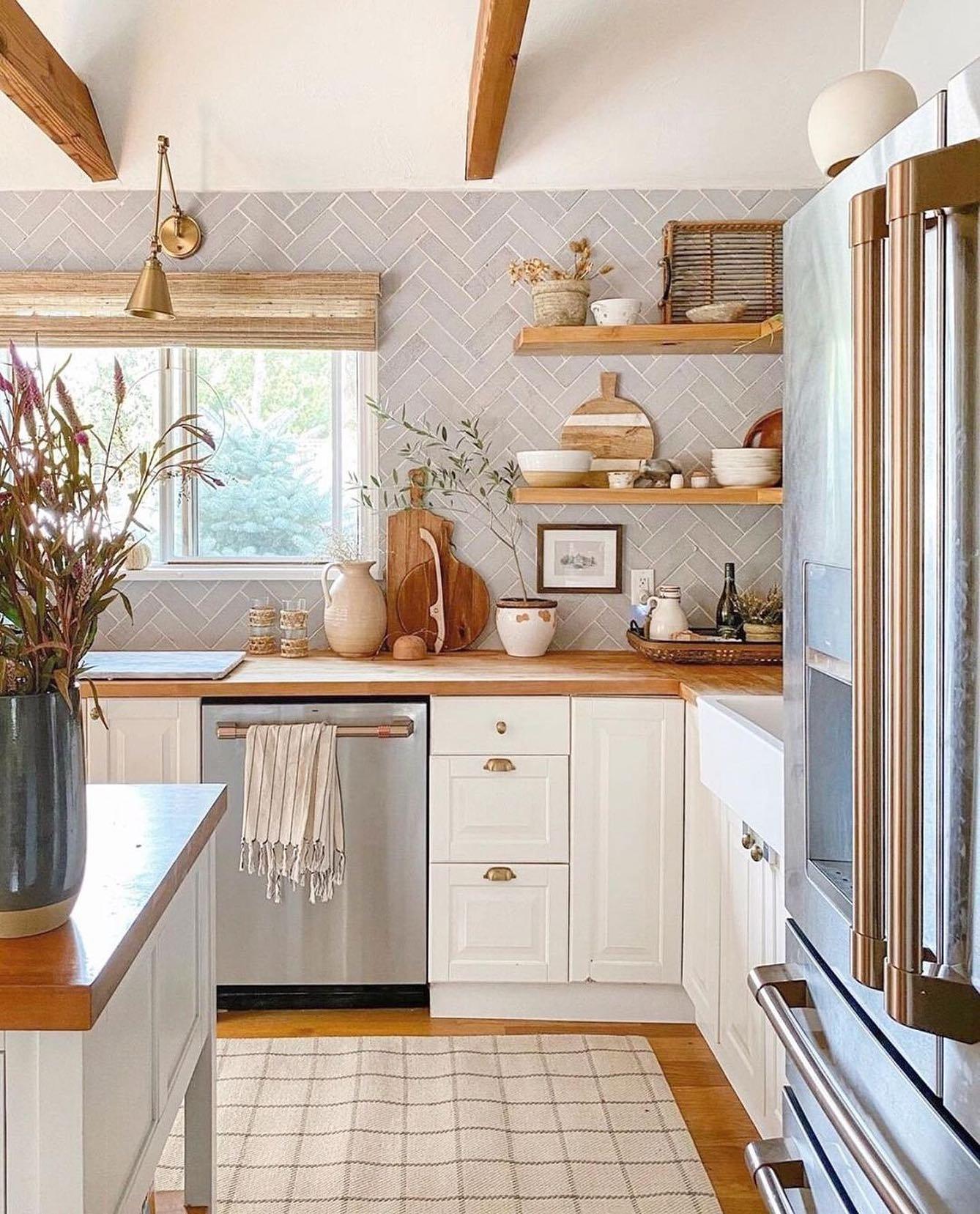 Distressed wood accents that bring farmhouse charm and authenticity to the kitchen