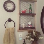 rustic shelving idea in place of old medicine cabinet space .