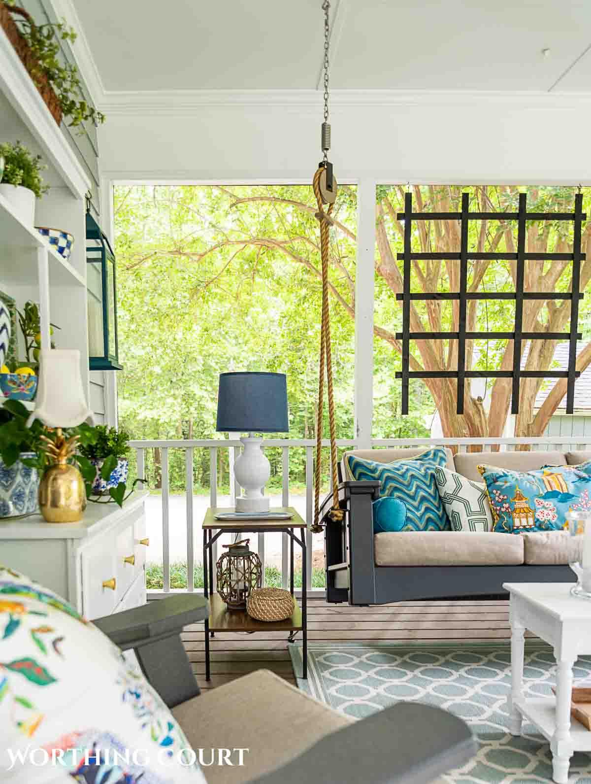 Incorporate multifunctional furniture for practicality on your screened porch