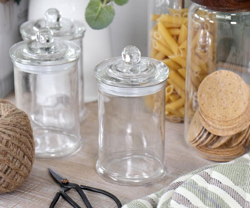 Use mason jars for stylish, functional bathroom storage