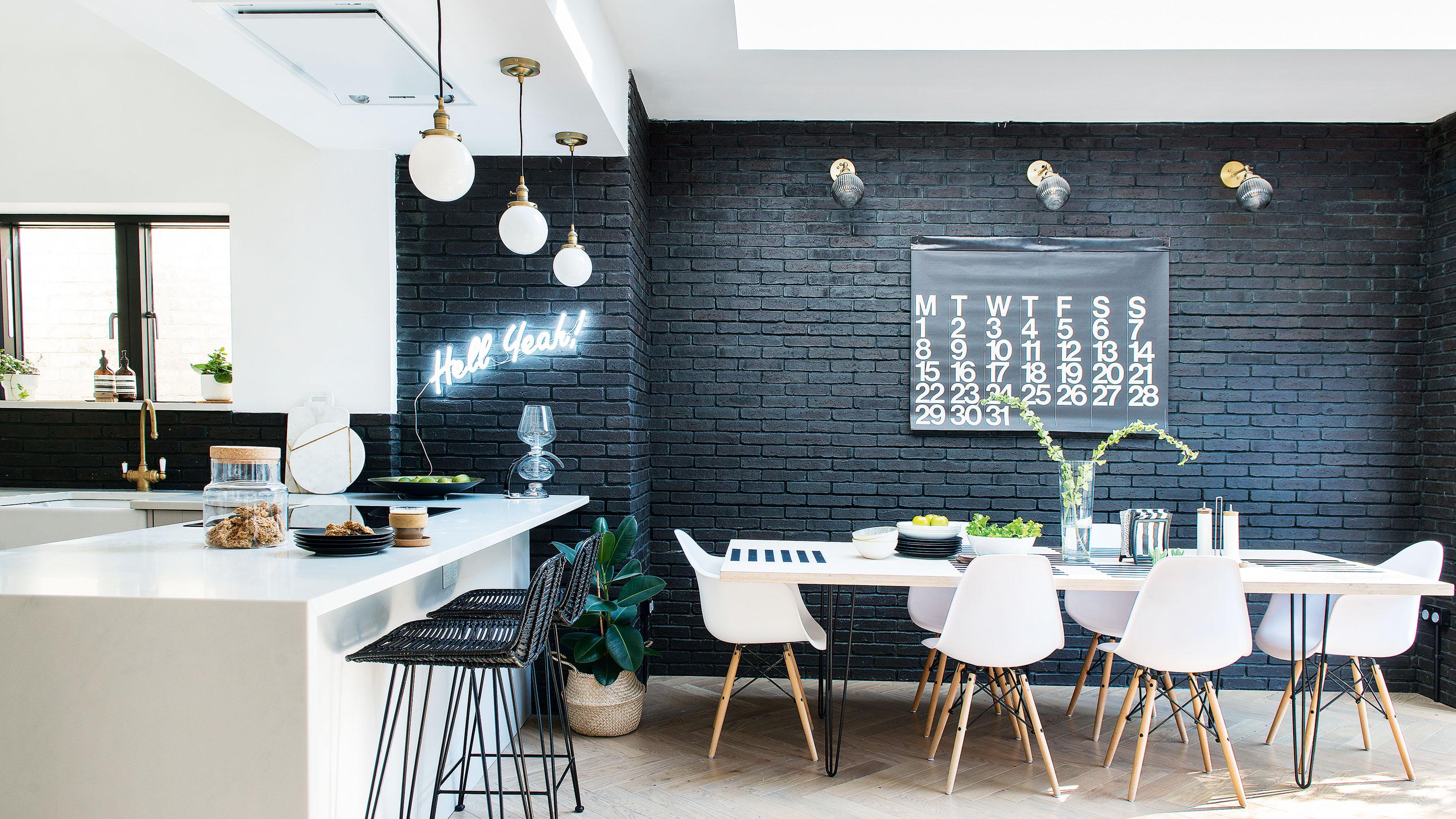 Add a bold accent wall to energize your eat-in kitchen space