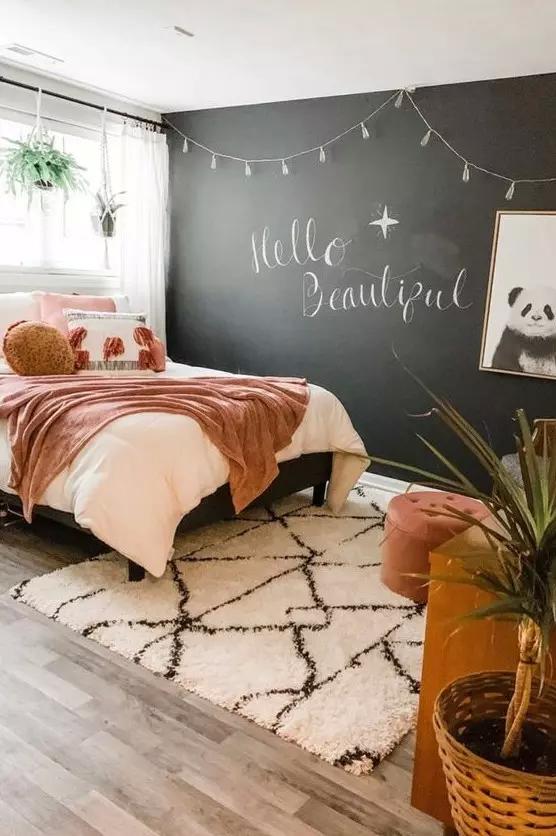 Hang a chalkboard wall for notes and creative expression in the teen girl bedroom