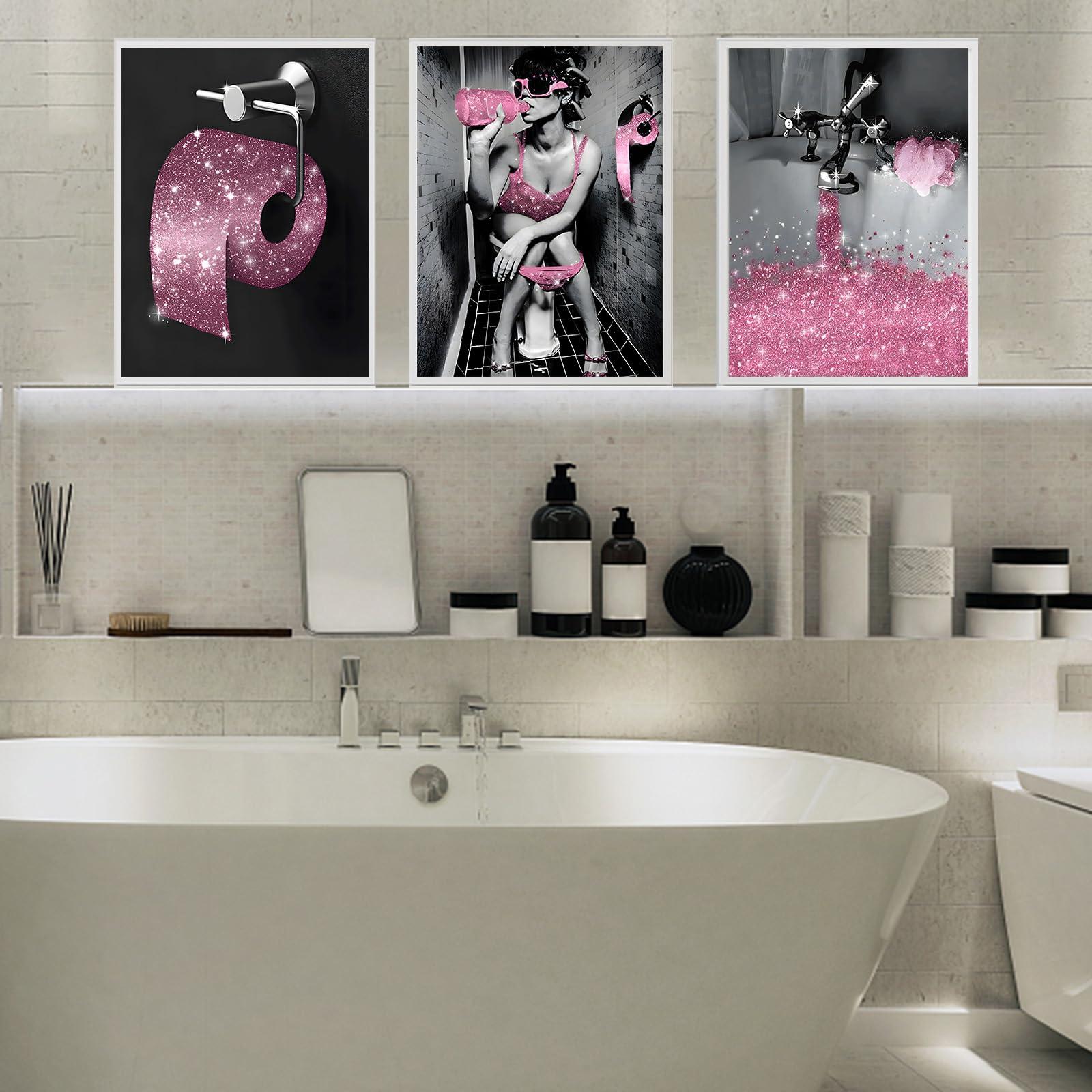 An assortment of framed art to personalize your eclectic bathroom