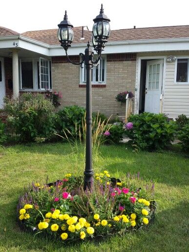 Lamp post garden design by Carin M. Diaz | Outdoor post lights .