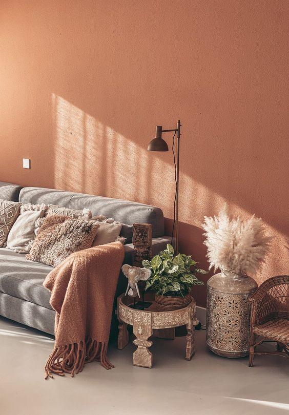 Warm, terracotta-colored walls create a cozy ⁤atmosphere for your ‌Earthy Living Room