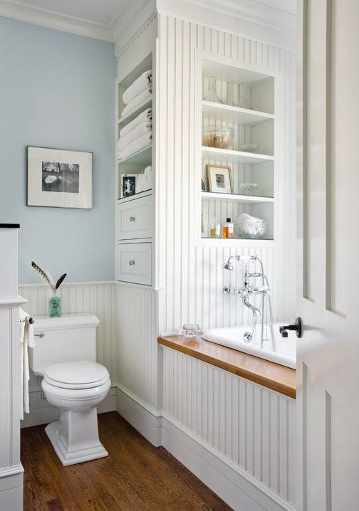 Incorporate built-in storage solutions for a clutter-free narrow bathroom