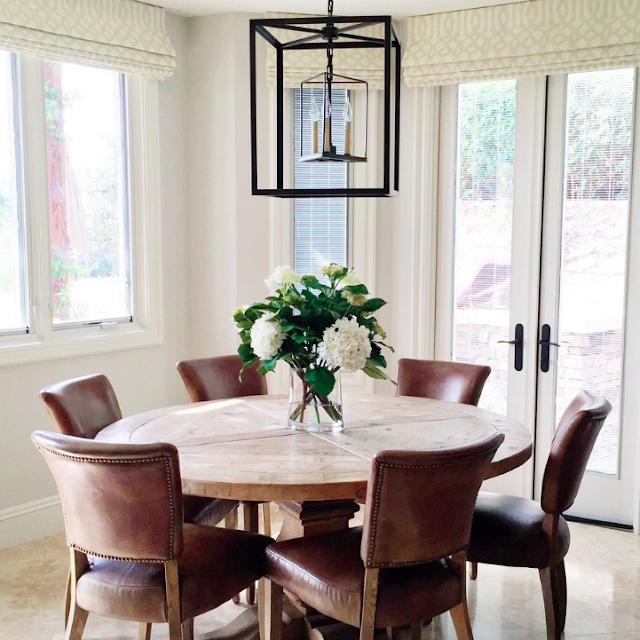 What are the advantages of round dining
  tables?
