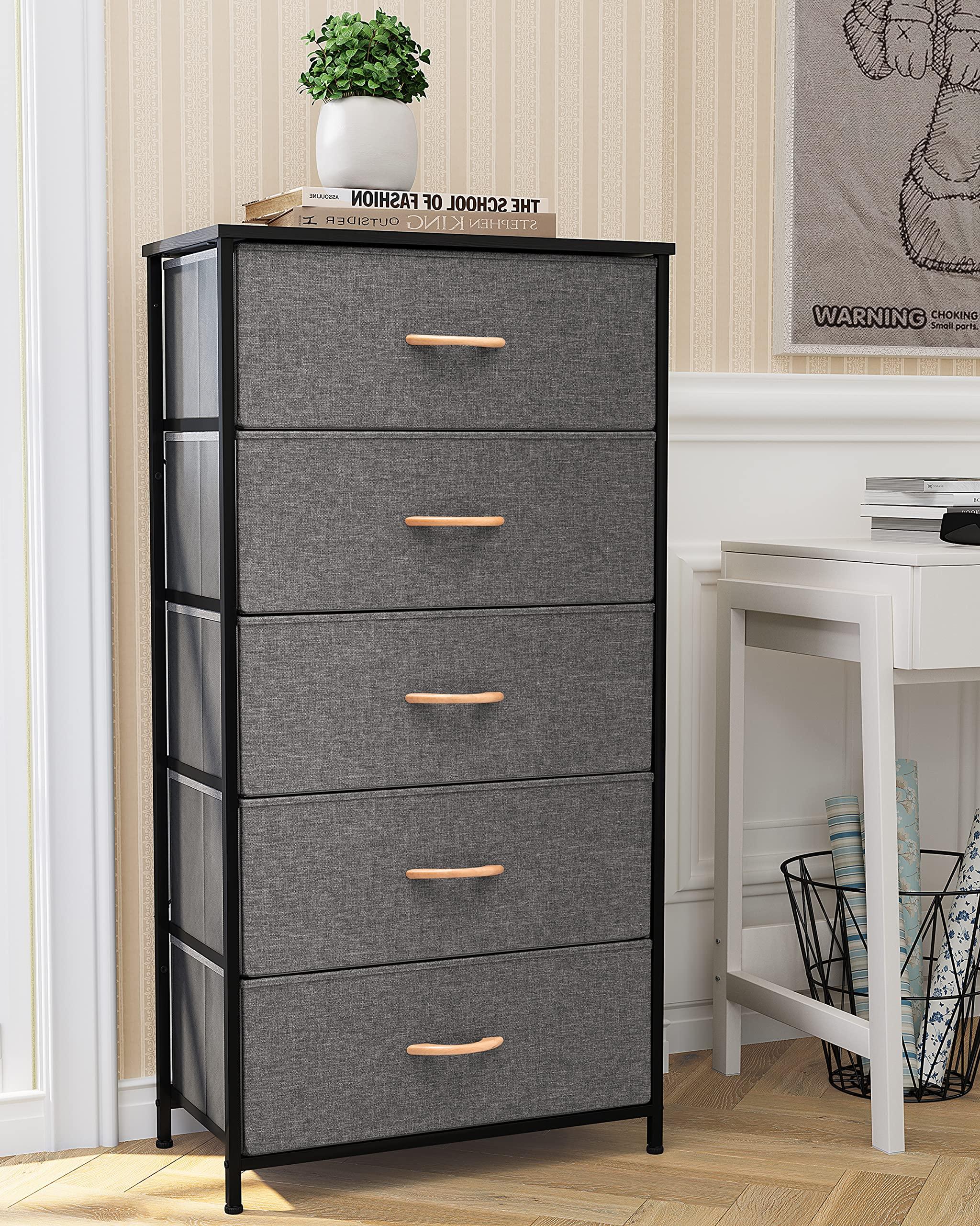 Use ‌a tall dresser to maximize vertical storage in your small bedroom