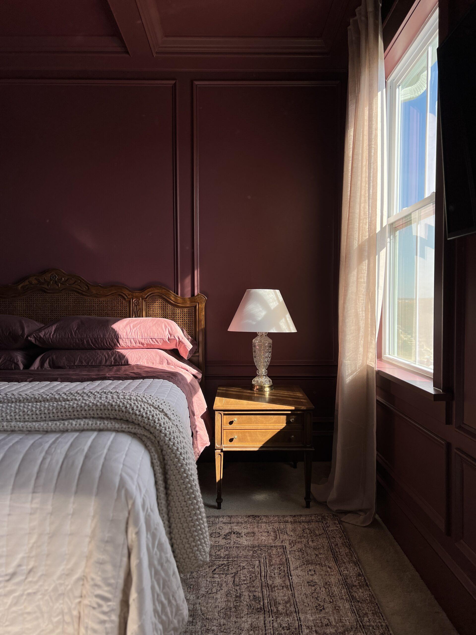 Pair a light wood bed frame with your Burgundy Bedroom decor