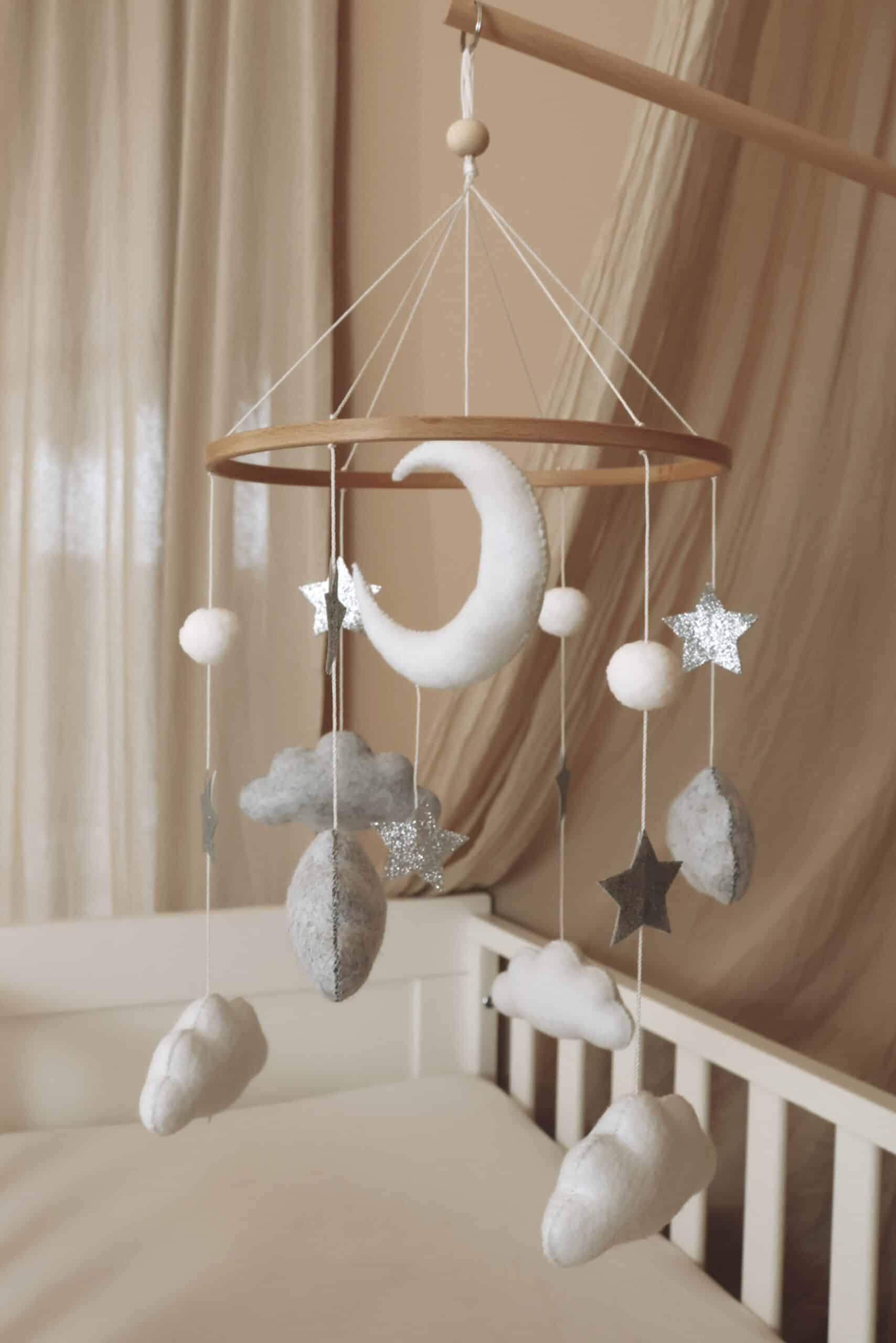 Handmade mobiles bring whimsical charm to the nursery nook