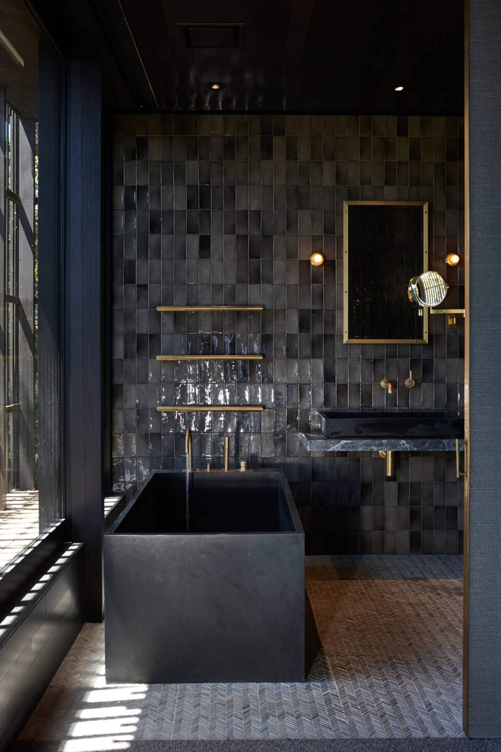 Dark hues introduce drama and sophistication⁢ to bathrooms