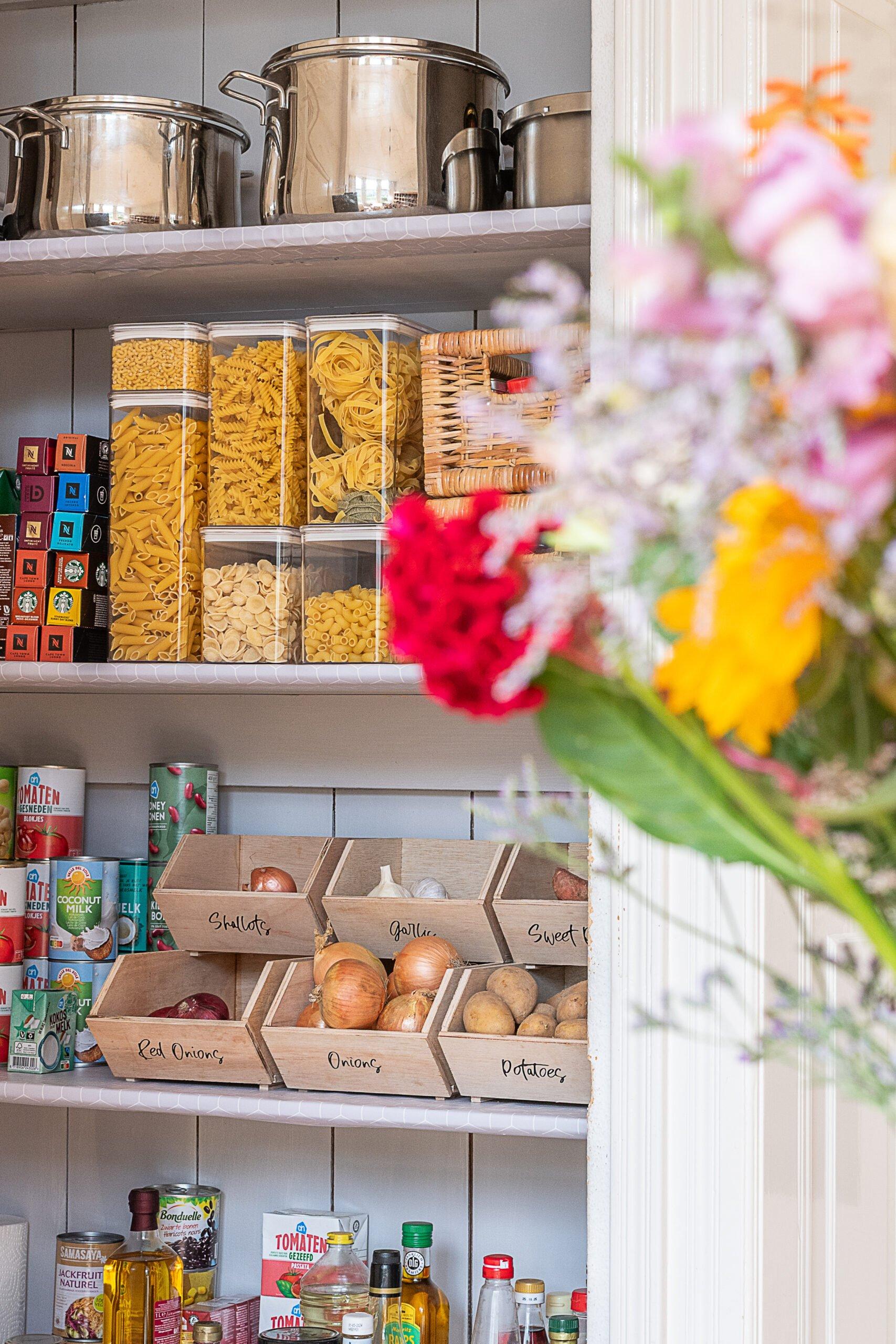 Invest in stackable containers to optimize pantry organization in your galley‌ kitchen