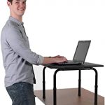 Amazon.com : Adjustable height standing desk. Convert your desk to .
