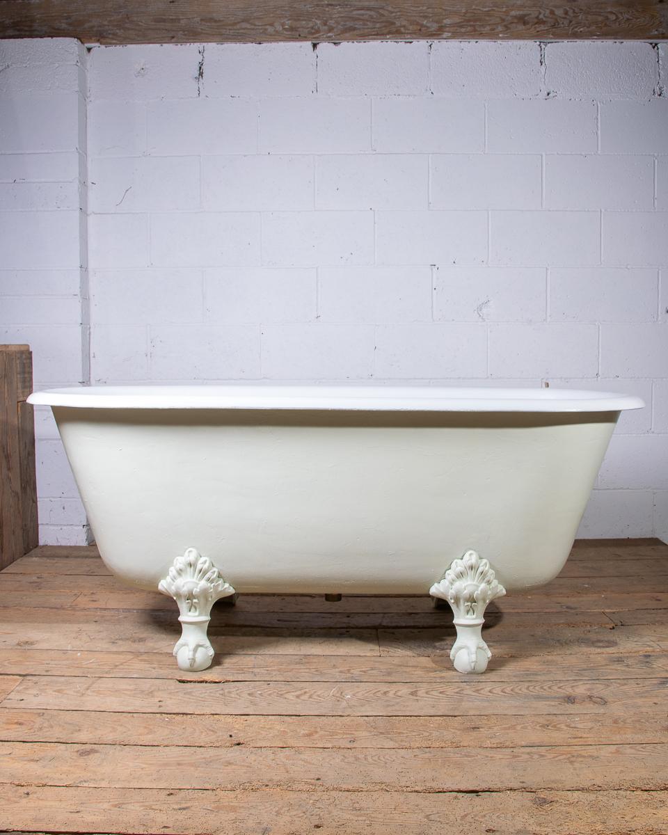 Vintage clawfoot tubs add elegance to farmhouse bathrooms