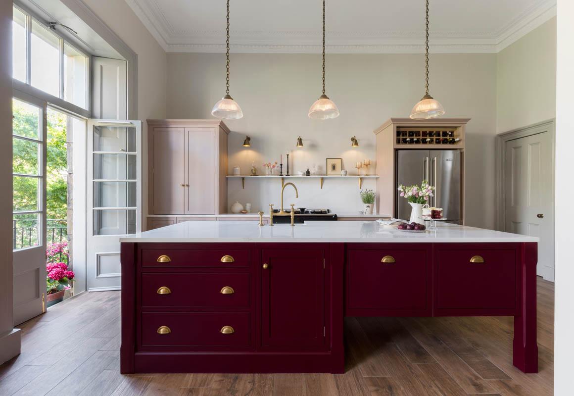 Paint your ceiling in a lighter shade to elevate your Burgundy Kitchen