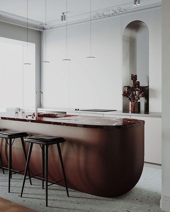 Introduce a​ statement‌ island as a focal point in your Burgundy Kitchen