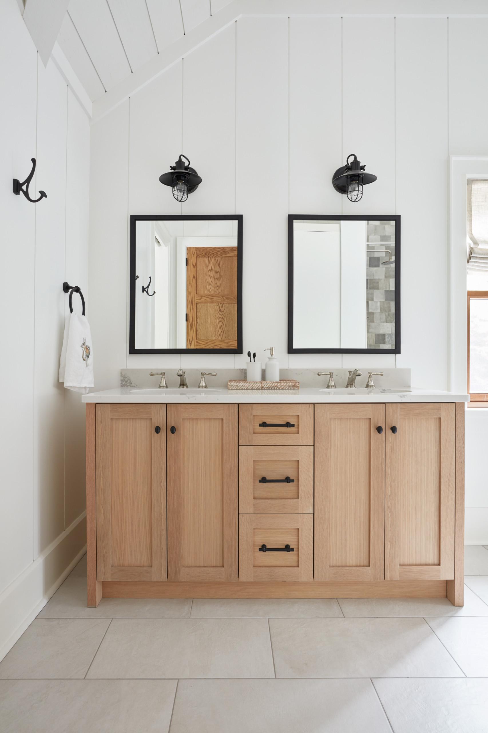 Select unique handles and knobs​ to personalize your eclectic bathroom cabinetry