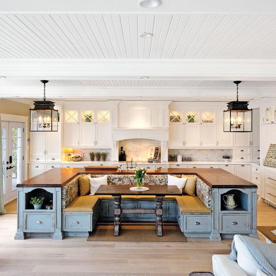 A large kitchen island provides ample workspace and seating in your farmhouse kitchen