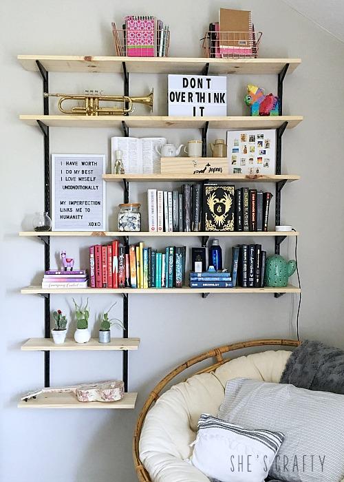 Install shelves to showcase her books and treasures within the teen girl bedroom