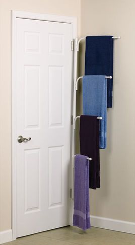 Bathroom Storage Ideas : including this multiple-tiered towel rack .