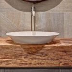 Thick wooden bathroom vanity top with vessel sink. Idea for third .