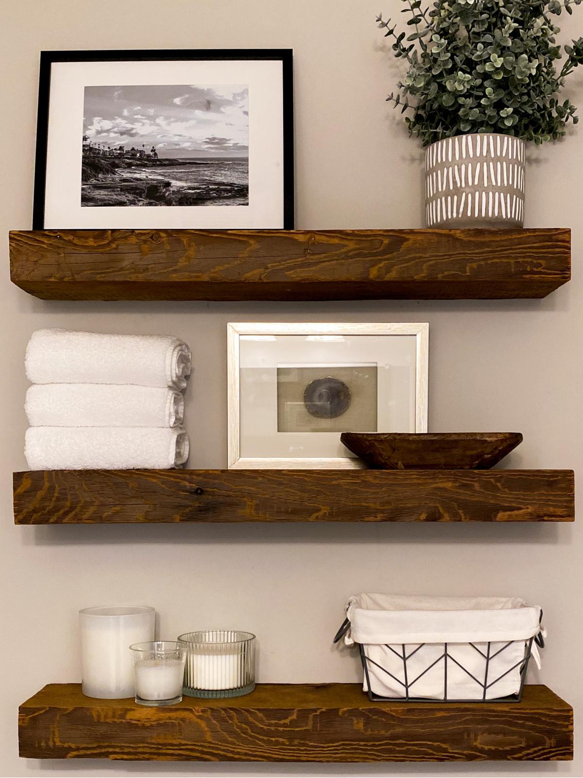 Install ​wall-mounted shelves for⁣ stylish storage in small bathroom